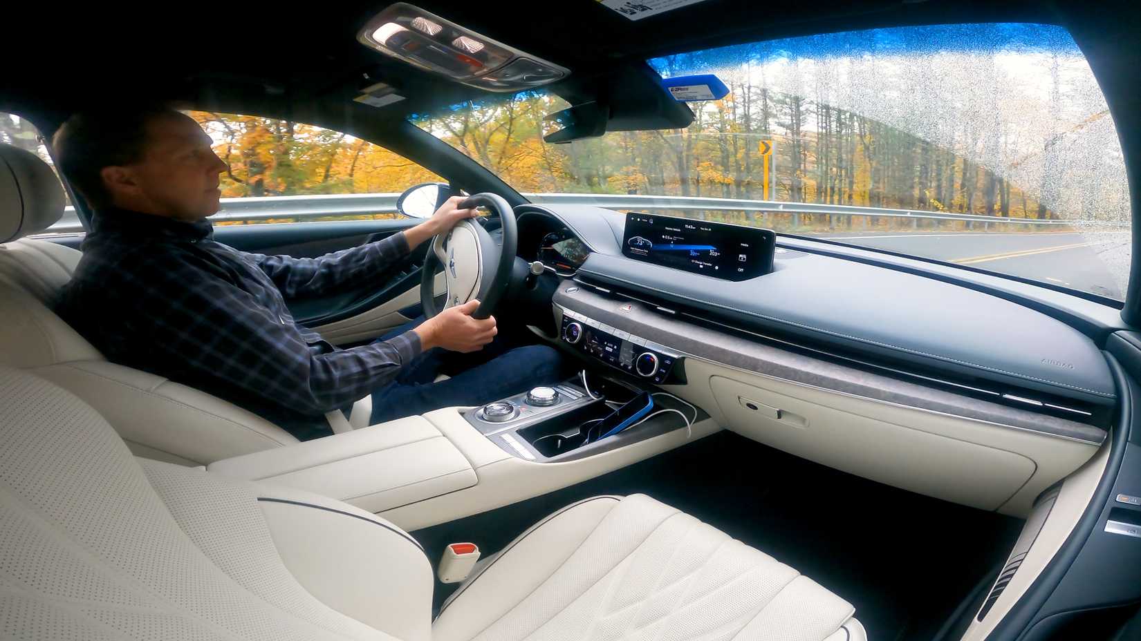 2023 Genesis Electrified G80 interior driving shot