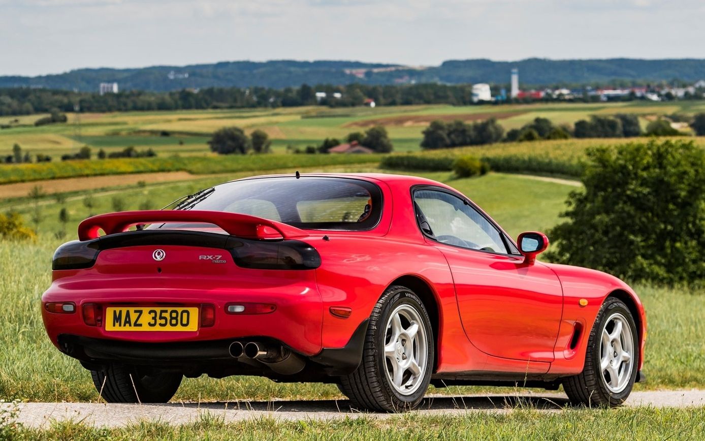 Red 1992 Mazda RX-7 parked