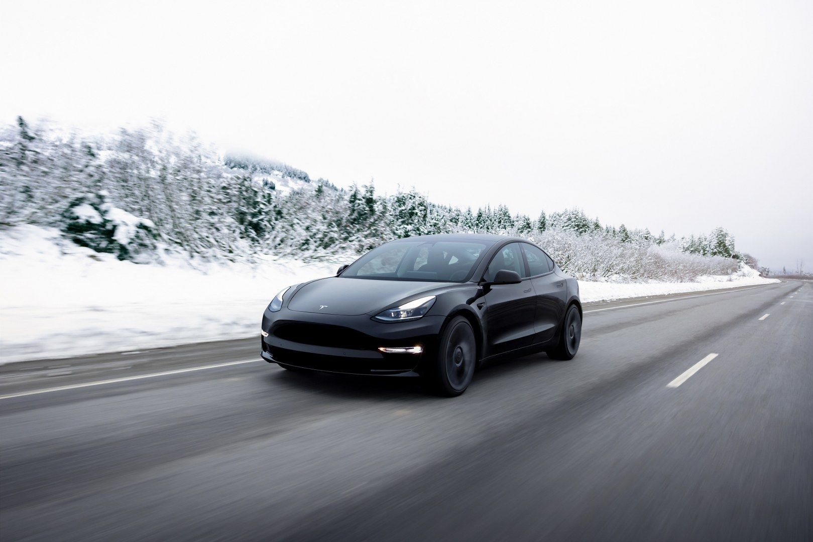 Tesla Model 3 driving during winter