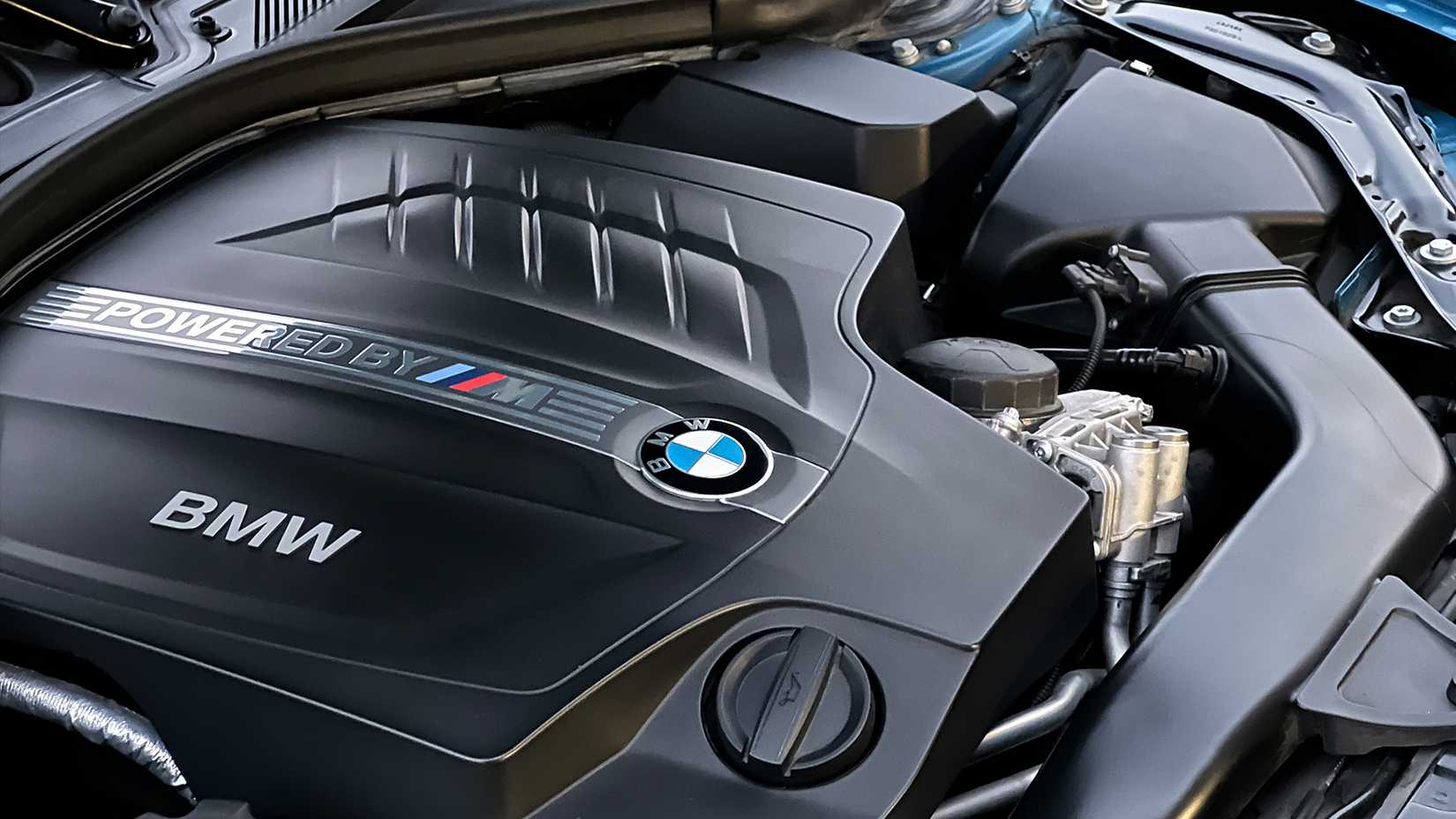 Shot of the BMW N55 engine under the hood of a 2017 BMW M2