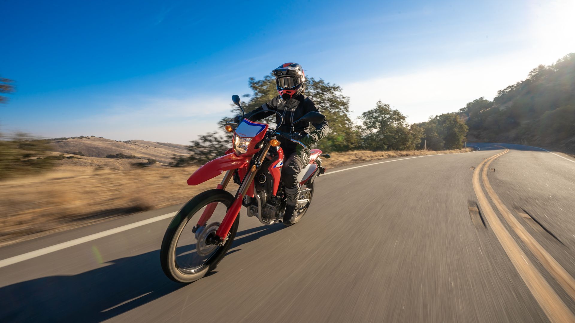 Red 2021 Honda CRF300L on the road