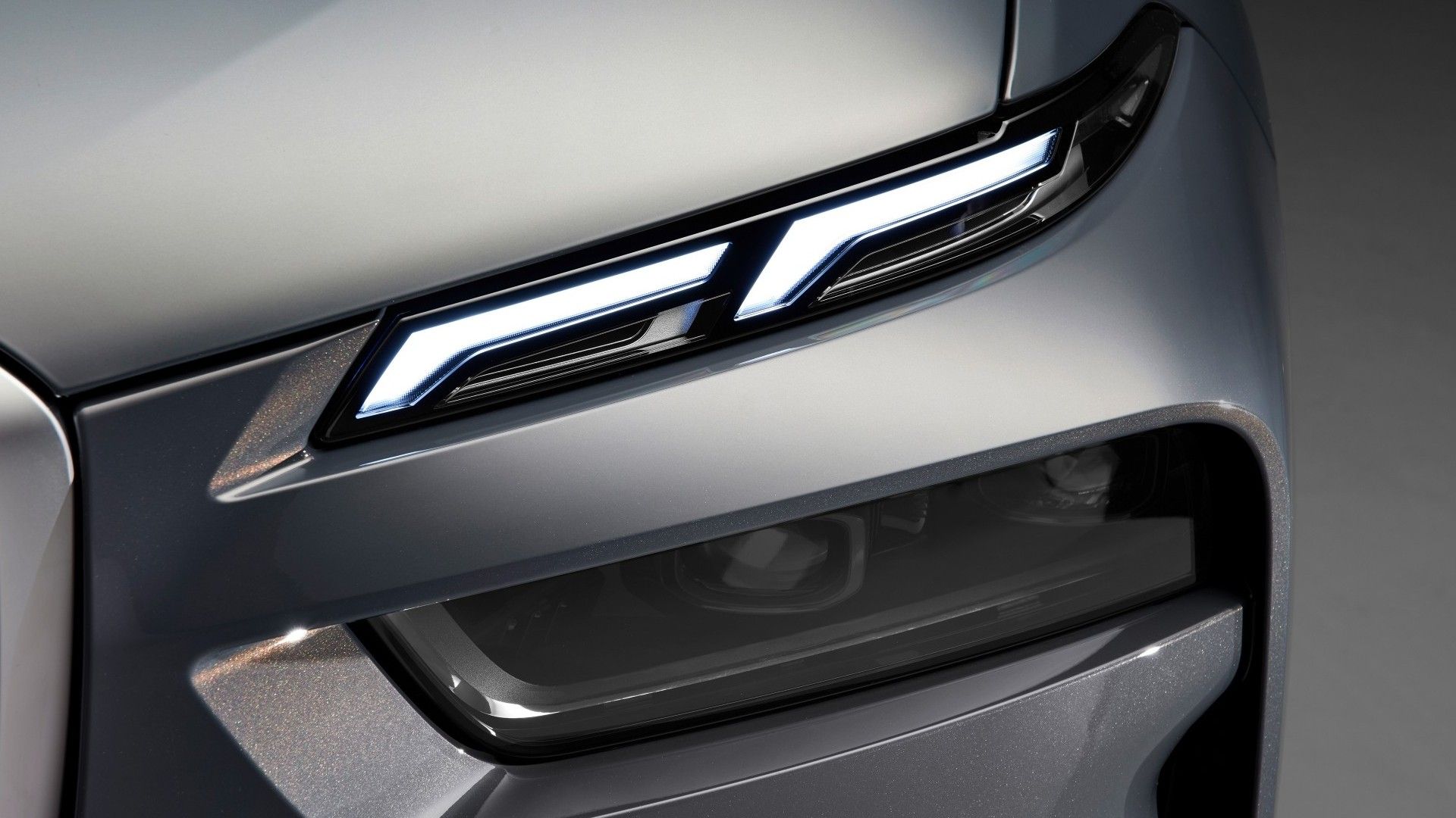 A right front side of a black BMW X7 2023