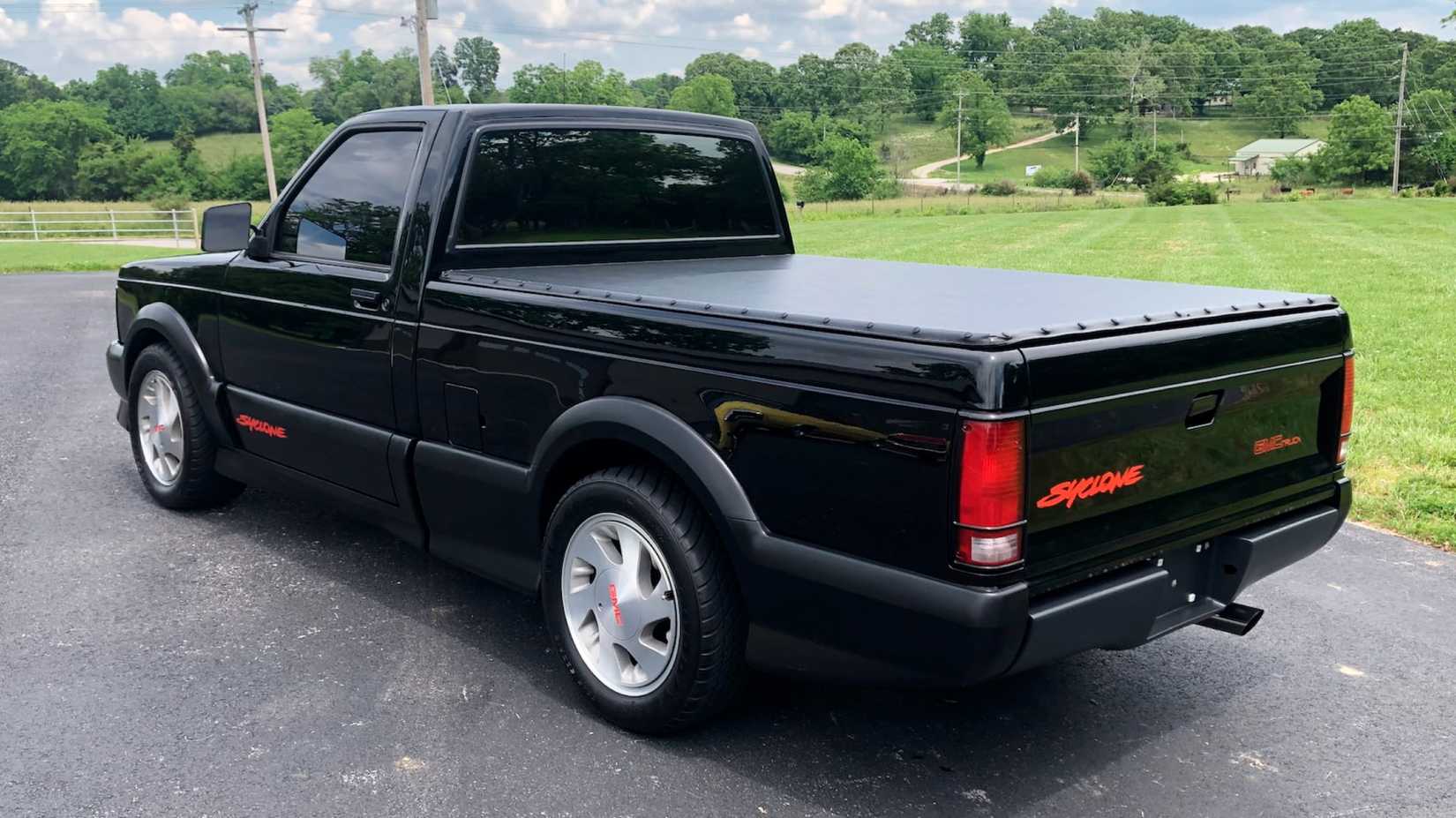 Rear three-quarters shot of a GMC Syclone parked