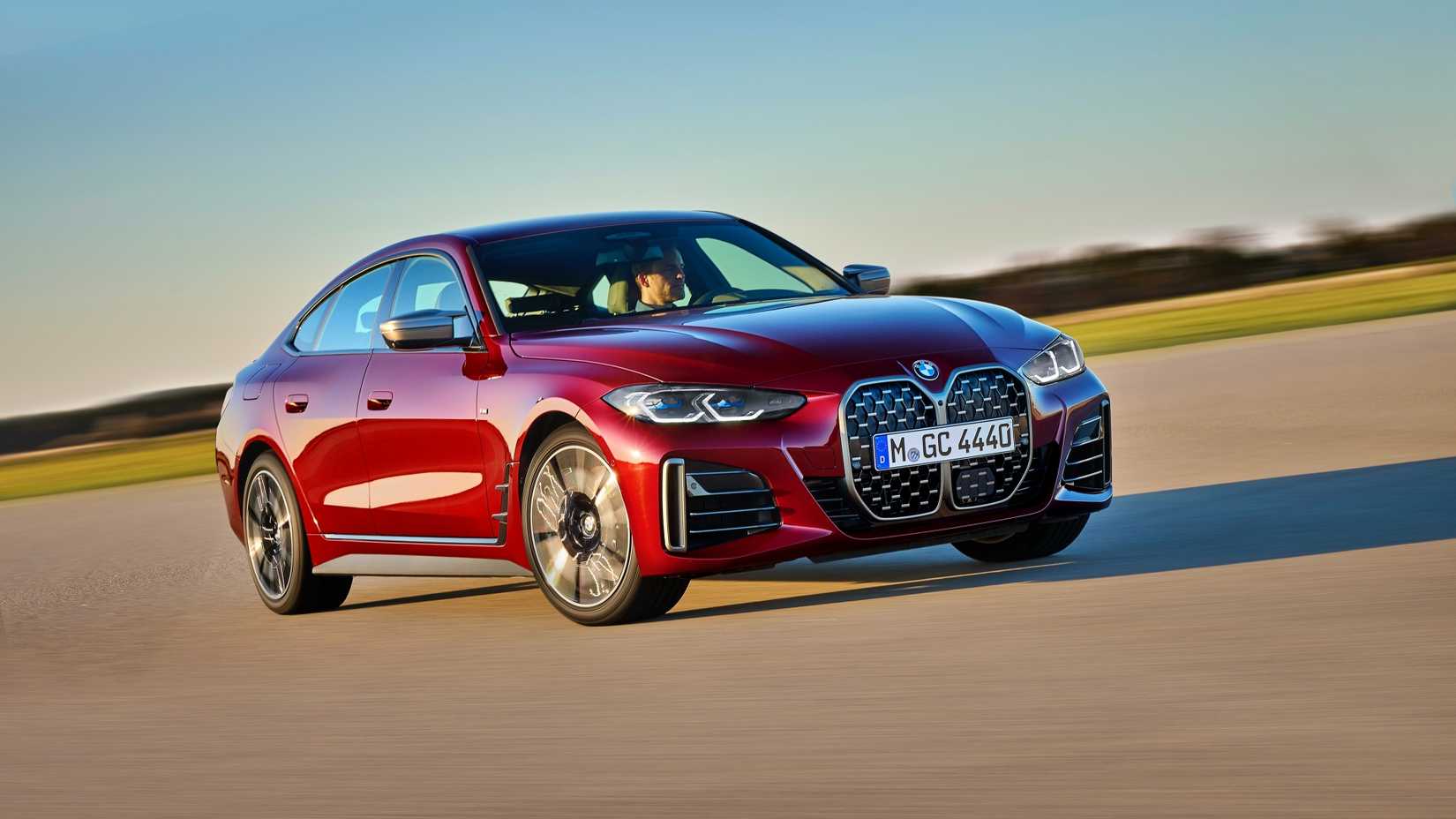 Red BMW 4 Series Gran Coupe driving