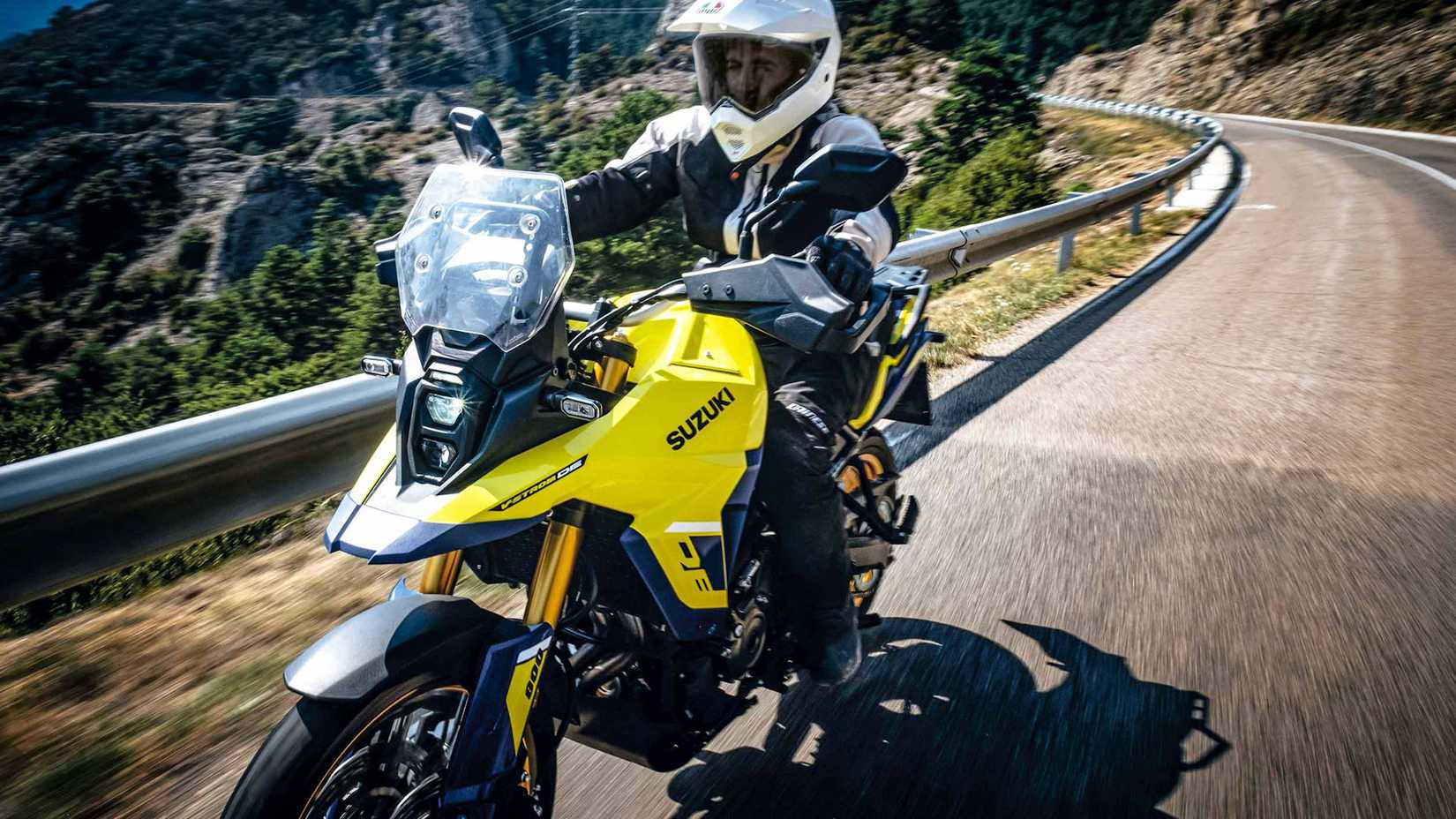 Yellow 2023 Suzuki V-Strom 800DE  cruising on the highway