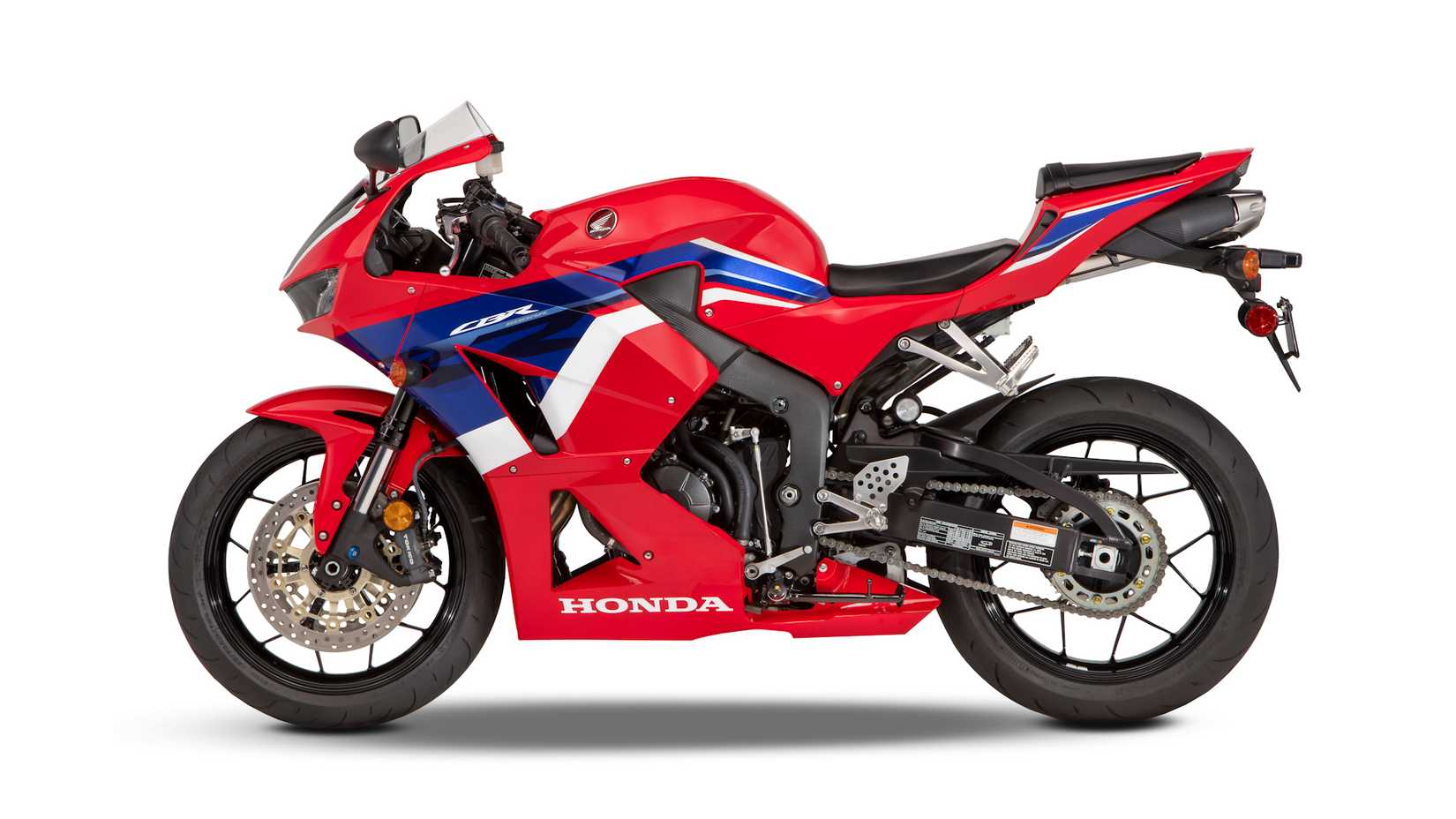 Red 2021 Honda CBR600RR static left-side profile view
