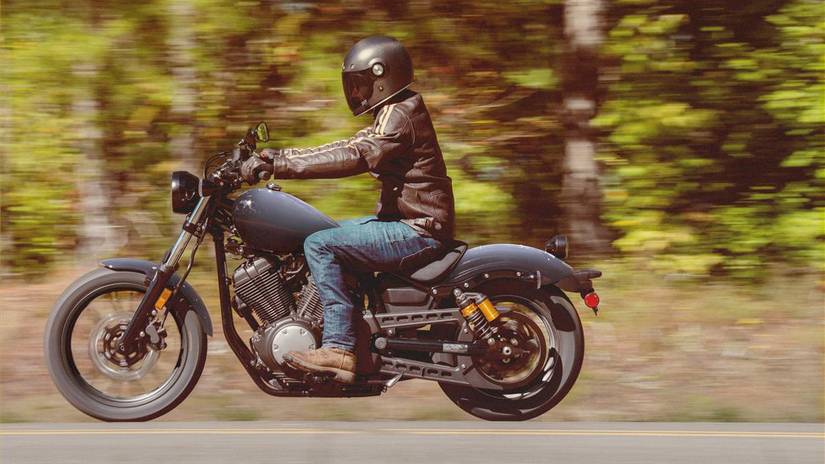 An action shot of a 2023 Yamaha Bolt R-Spec driving on the road