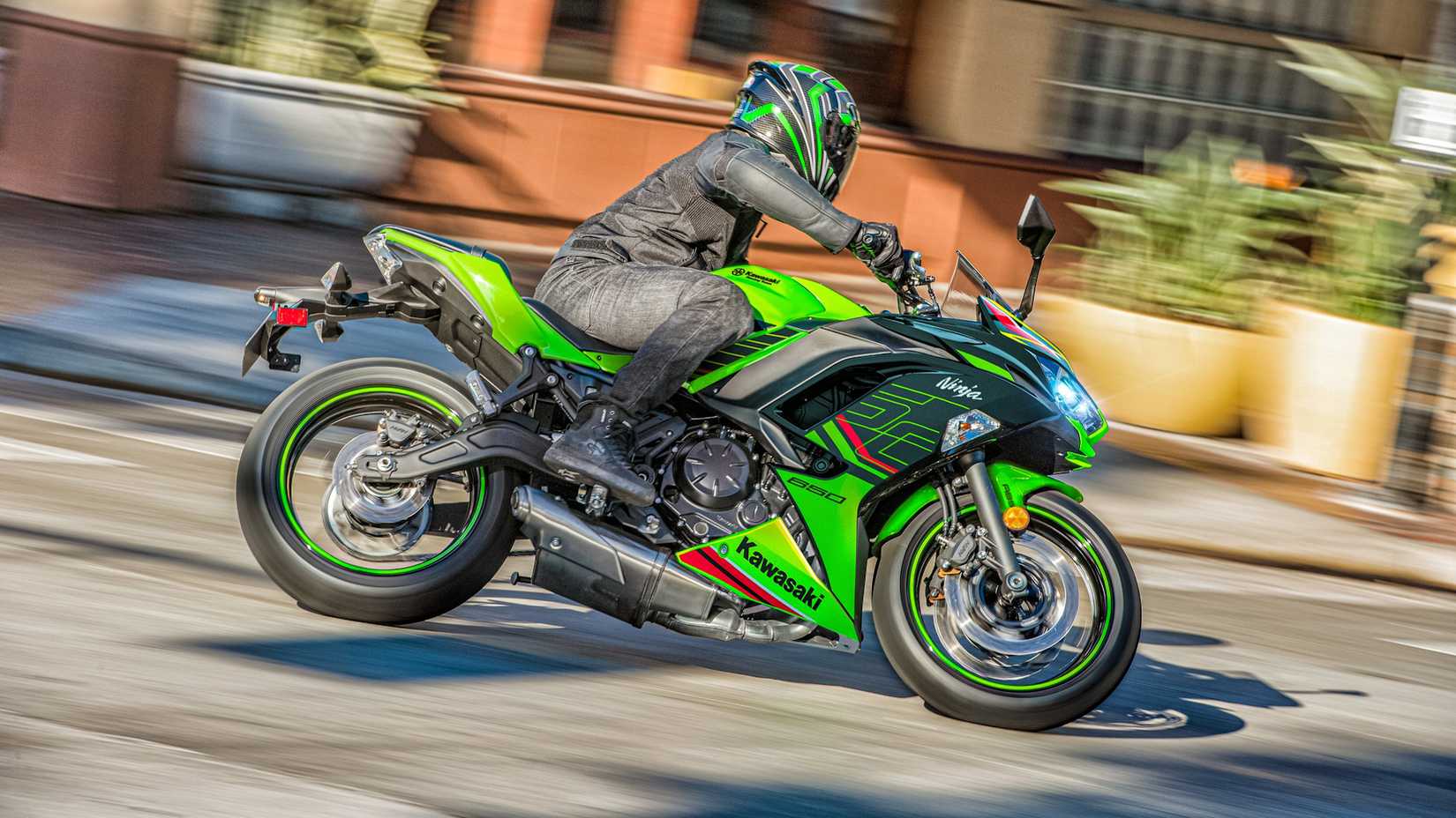 Green 2023 Kawasaki Ninja 650 KRT Edition Turning