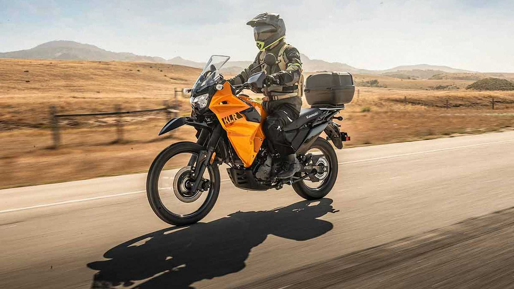 2023 Kawasaki KLR650 Yellow cruising on the road