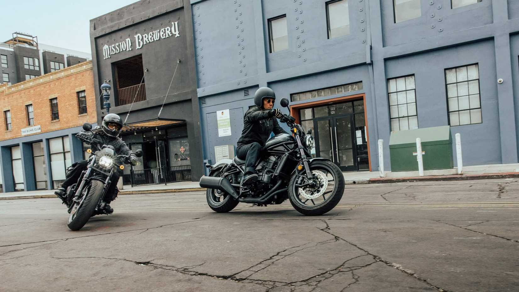 An action shot of two 2023 Honda Rebel 1100