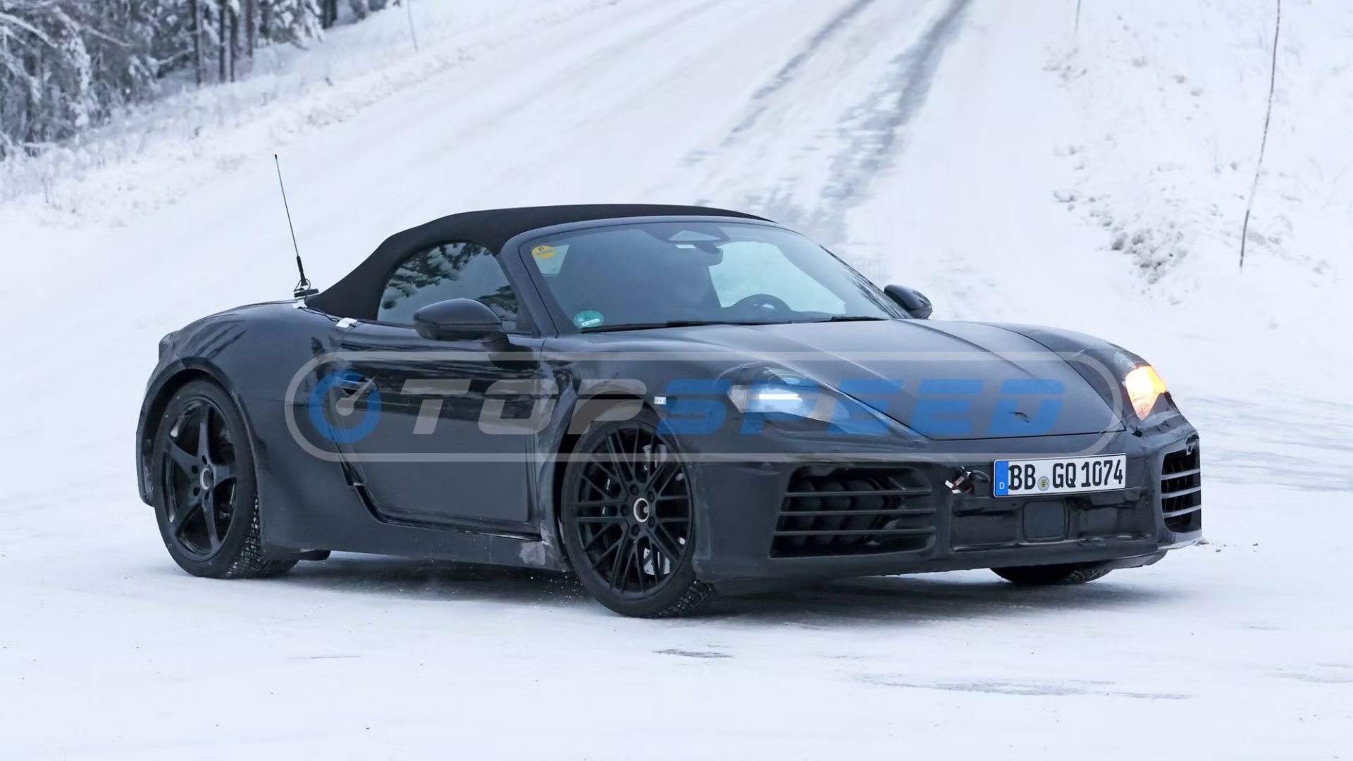 A 2025 Porsche 718 Boxster EV being tested in the snow
