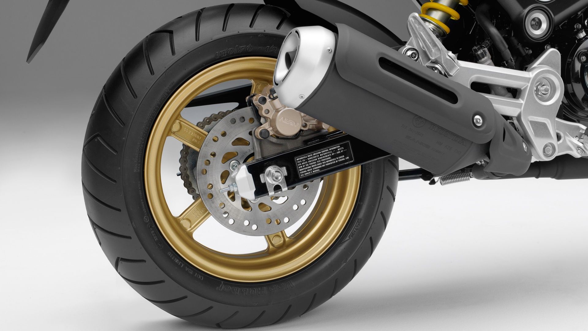 A close up shot of the 12 inch wheel of the Honda Grom