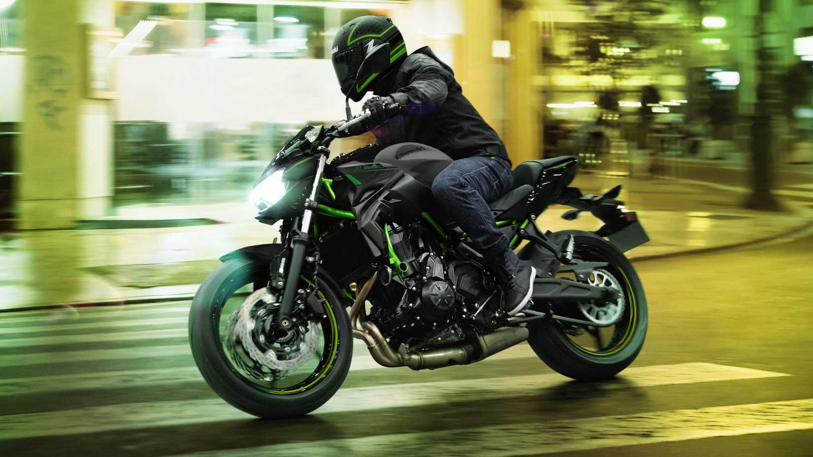 Gray 2023 Kawasaki Z650 roaming the city