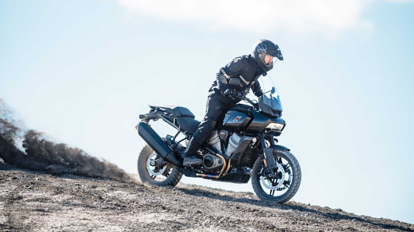 Black 2022 Harley-Davidson Pan America 1250 tearing down a trail