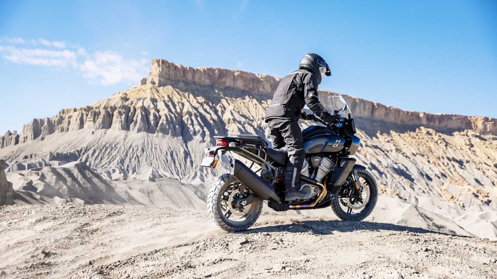 Black 2021 Harley-Davidson Pan America 1250 trail-riding in the desert