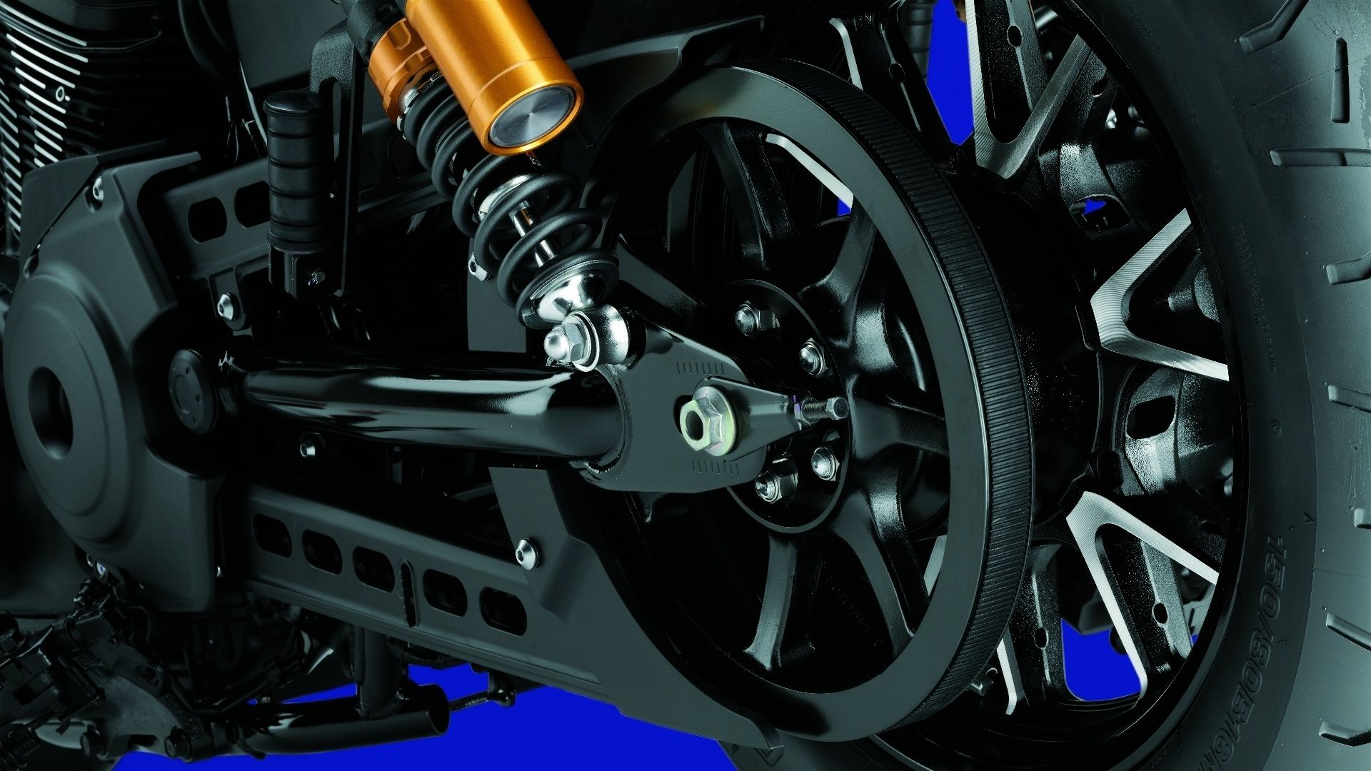 A close up shot of the Yamaha Bolt R-Spec's belt drive and rear suspension with its gas canister