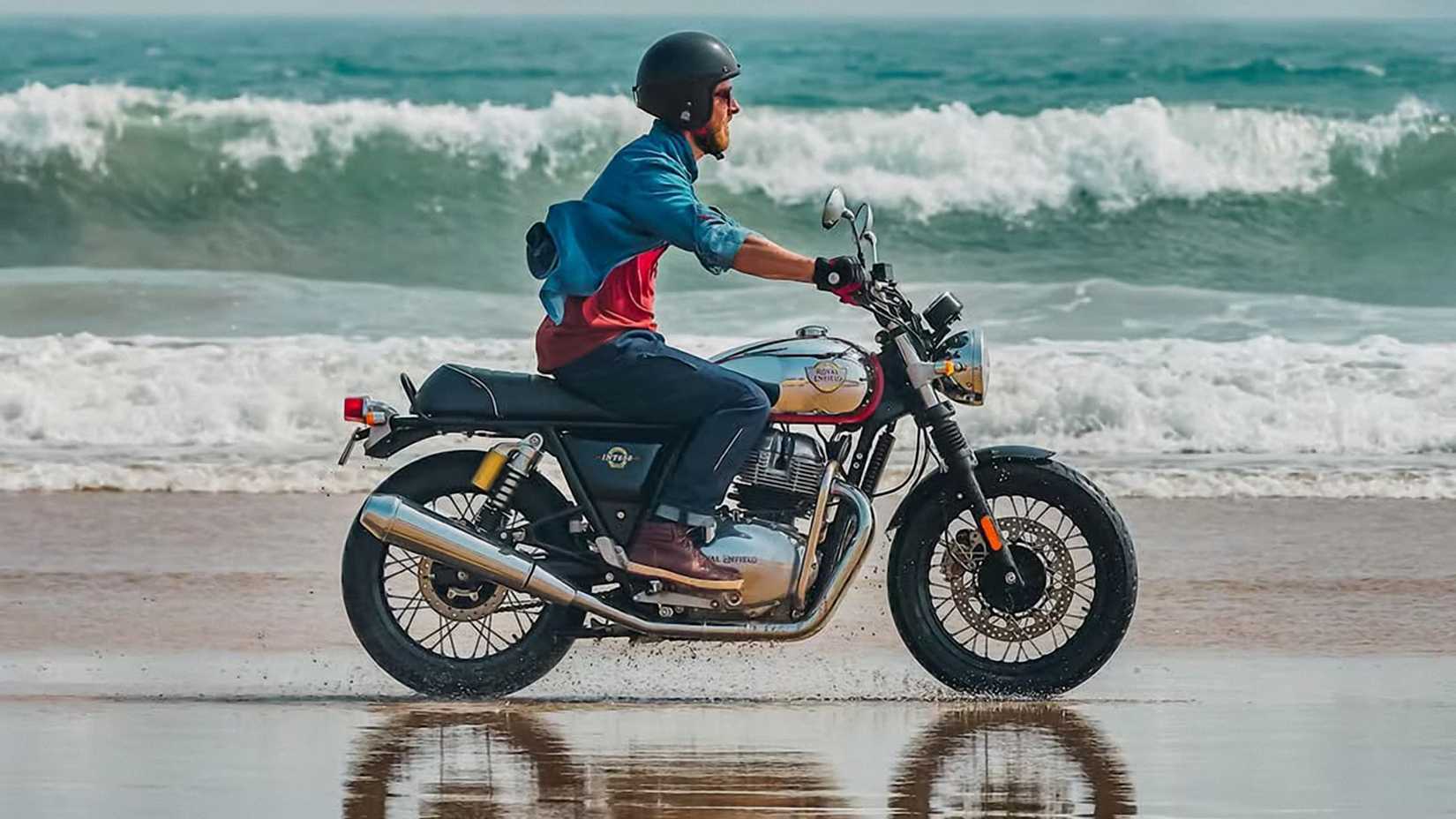 A 2022 Royal Enfield INT650 cruising the beach