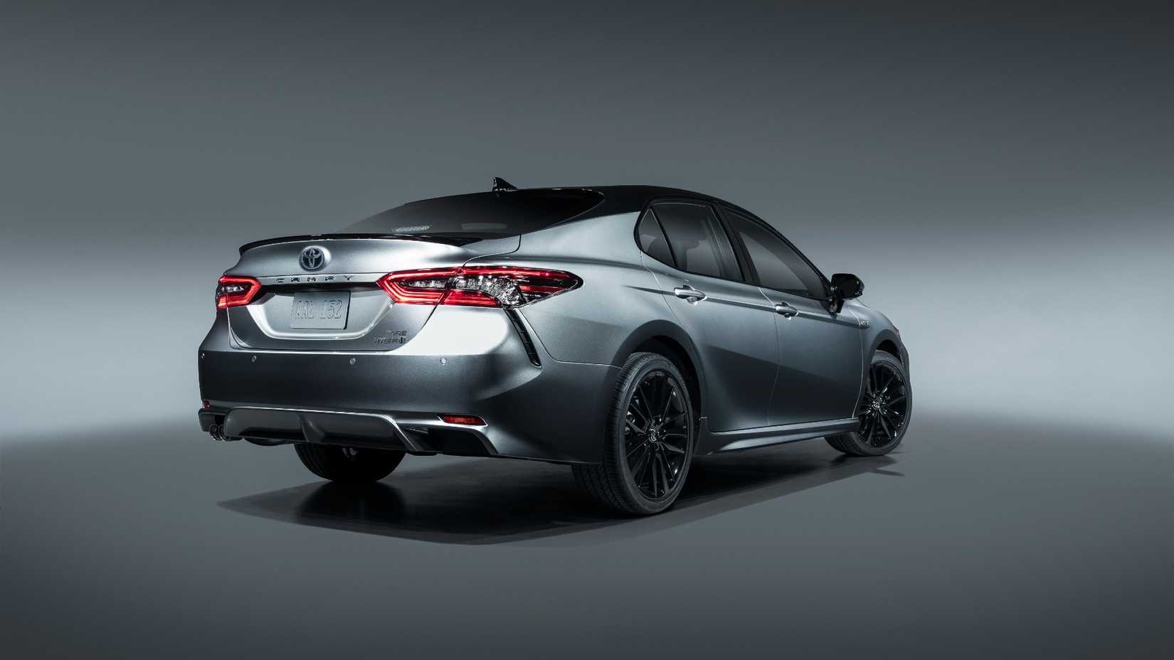 2021 Toyota Camry Hybrid in silver rear 3/4
