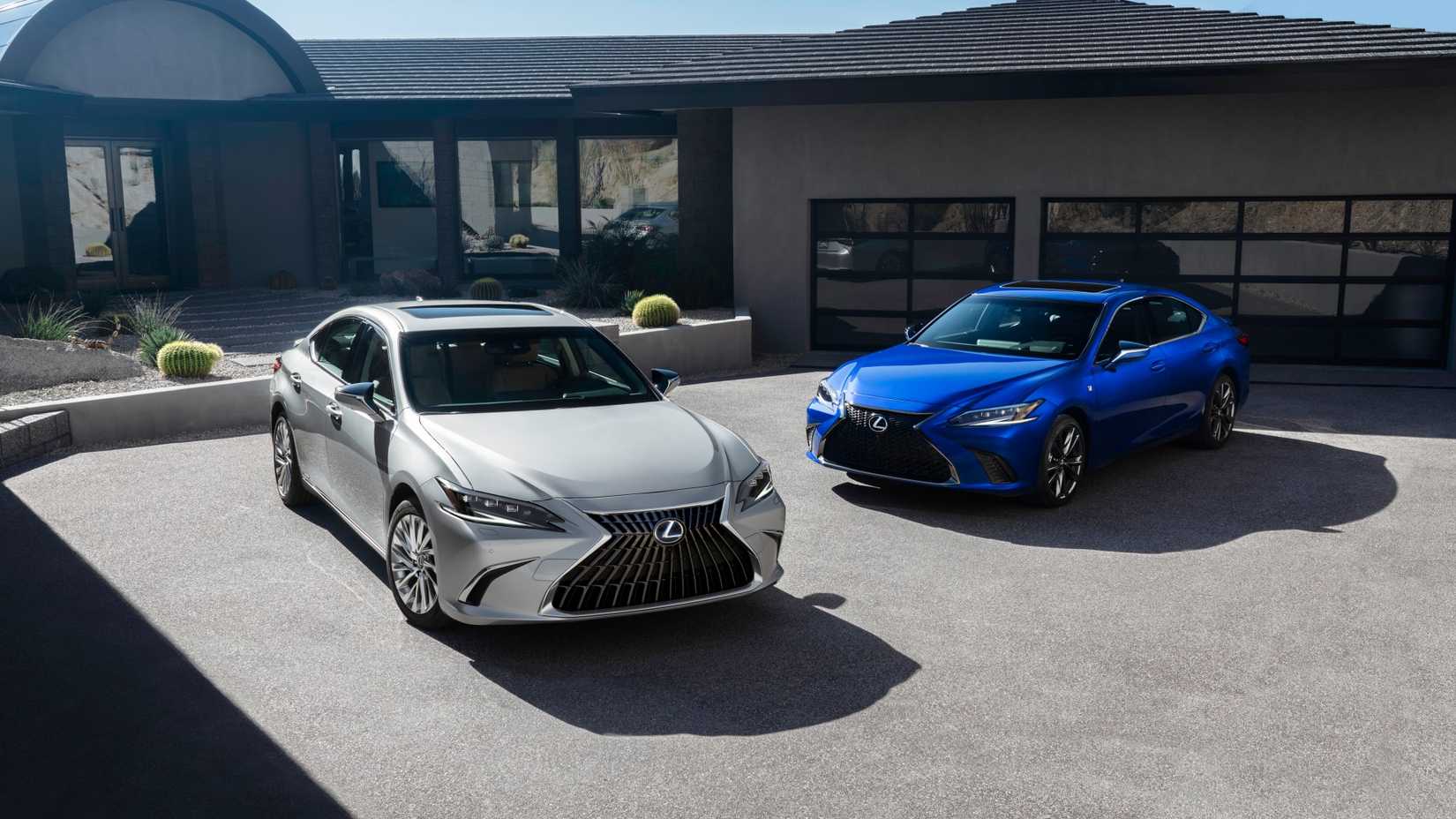 Two 2022 Lexus ES 300h sedans parked