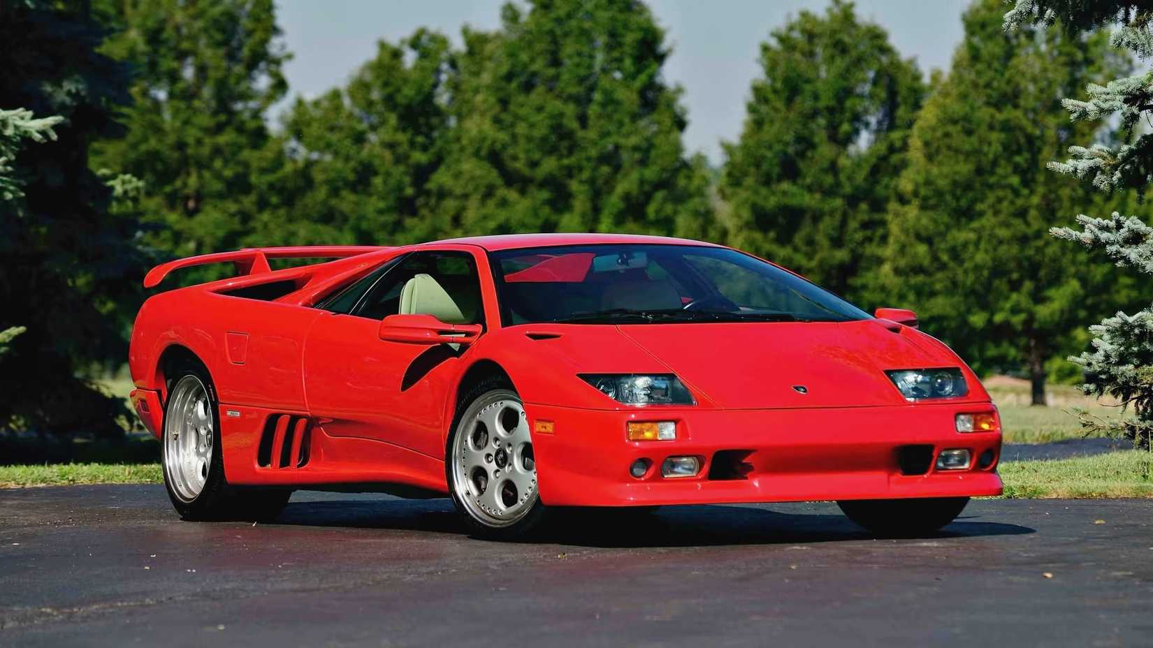 Red 1999 Lamborghini Diablo parked
