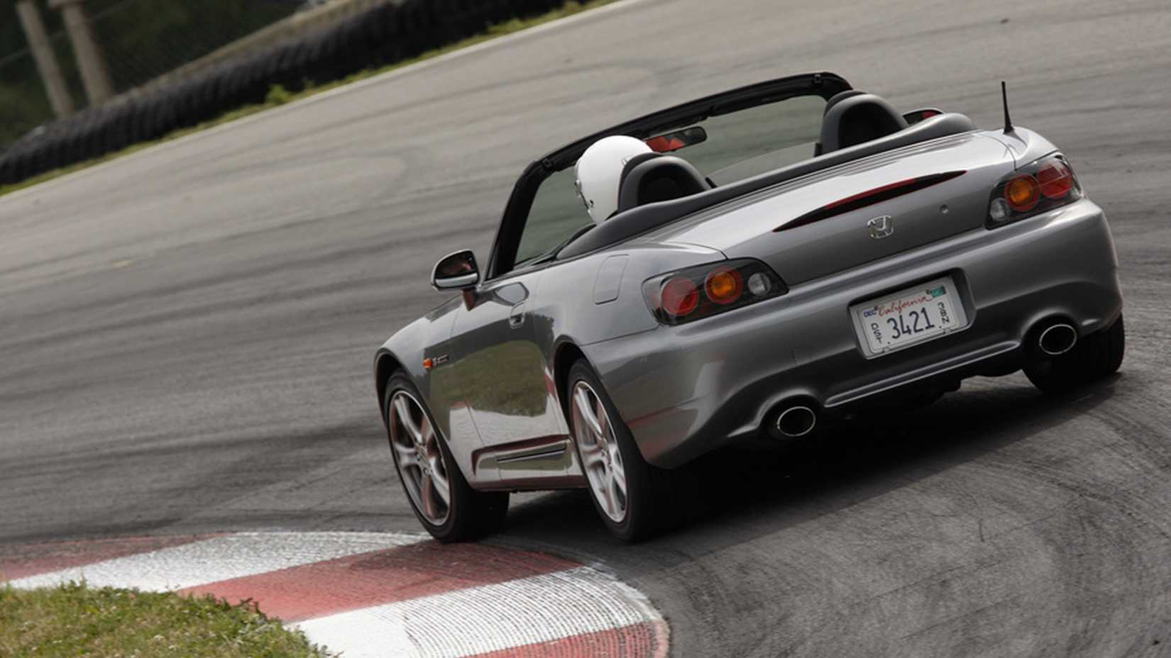 Rear shot of a gray Honda S2000 on the track