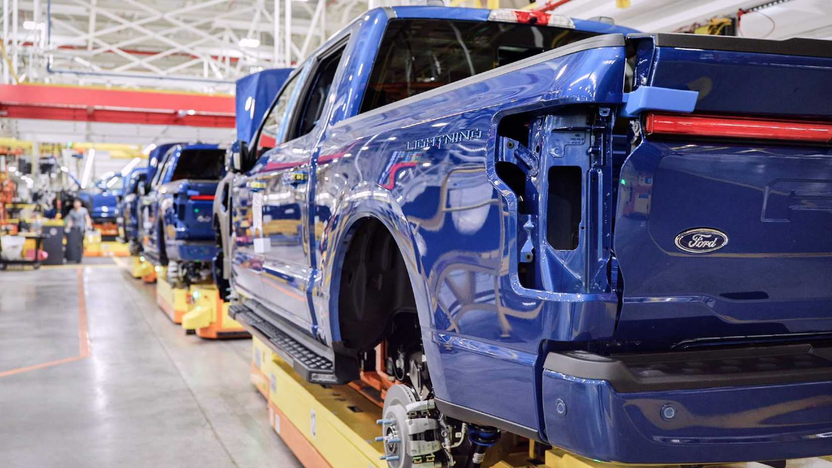 Blue F-150 lightning in factory