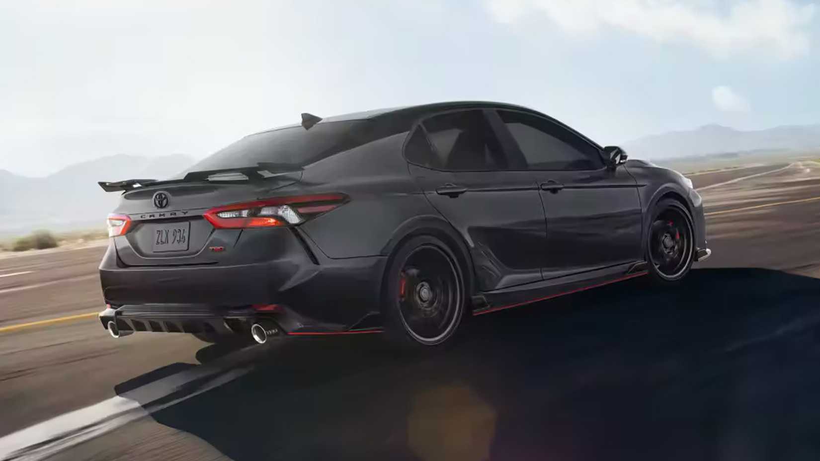 Action photo of the rear of a 2023 Toyota Camry TRD