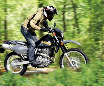 Black Suzuki DR650S navigating a trail