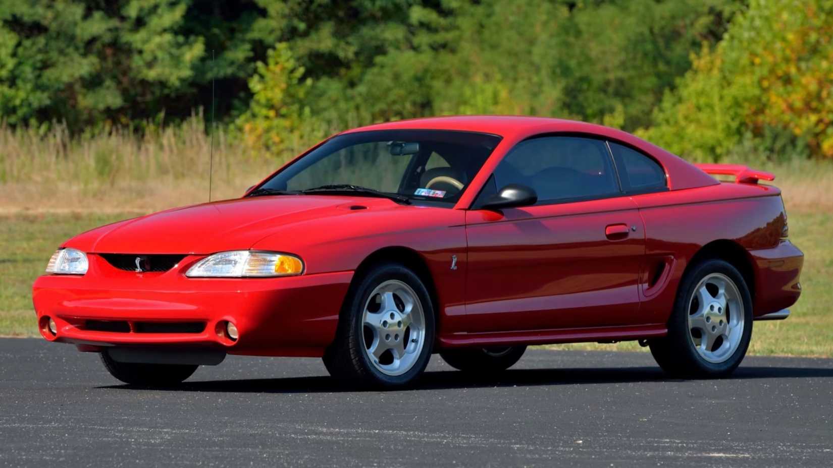 Red 1994 Ford Mustang Parked on Tarmac Front 3/4 Shot