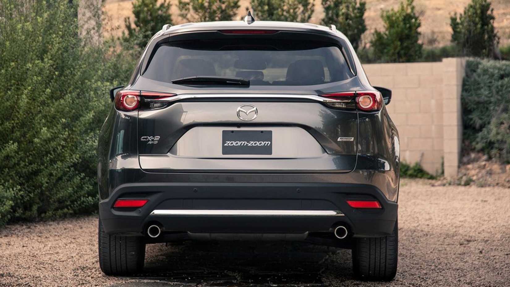 2023 Mazda CX-9 rear shot parked in gravel driveway