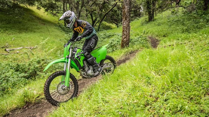 An action shot of a Kawasaki KLX300R