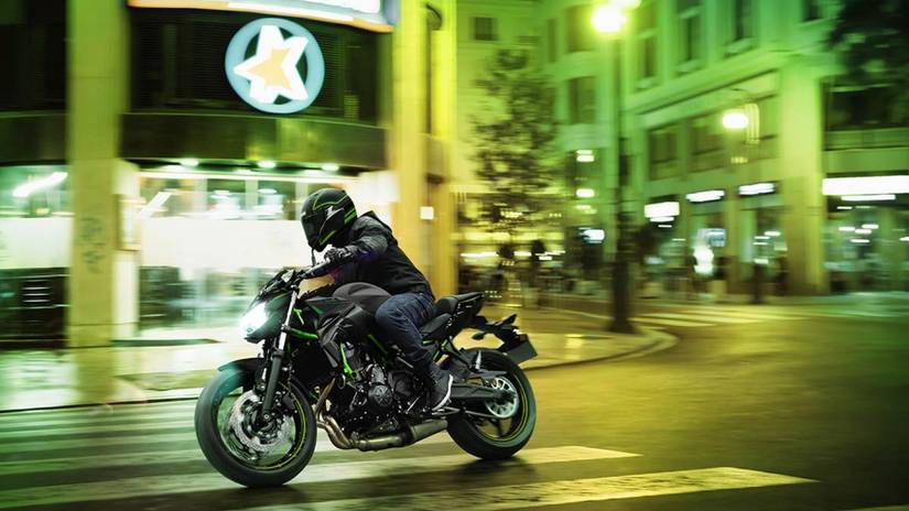 Action shot of a Kawasaki Z650 being ridden