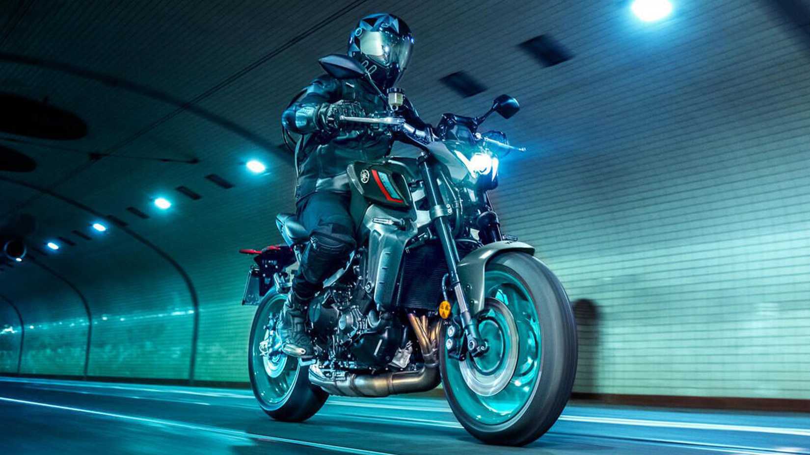 Rider on a 2022 Yamaha MT-09 cruising through a tunnel