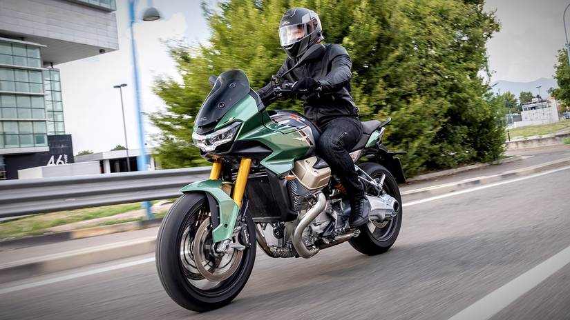 2023 Moto Guzzi V100 Mandello in action front third quarter rolling shot