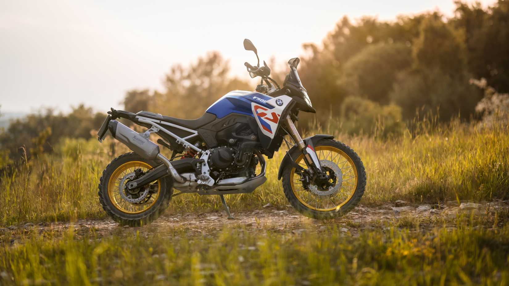 A cinematic shot of the 2024 BMW F 900 GS on a trail