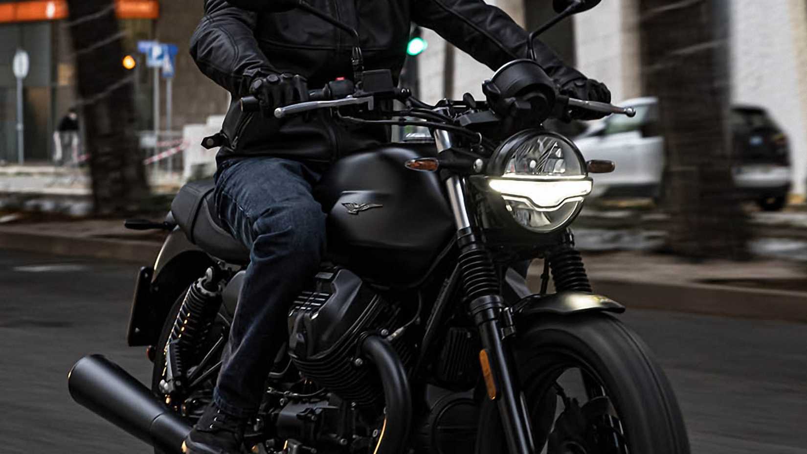 Black 2023 Moto Guzzi V7 Stone front quarter close-up detail