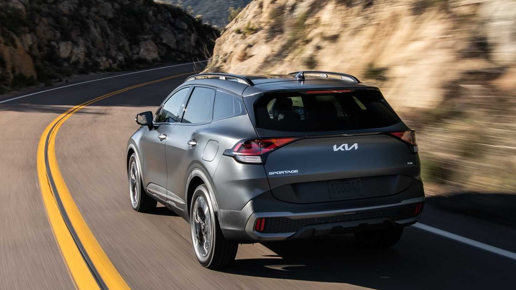 Kia Sportage PHEV rear 3/4 action shot