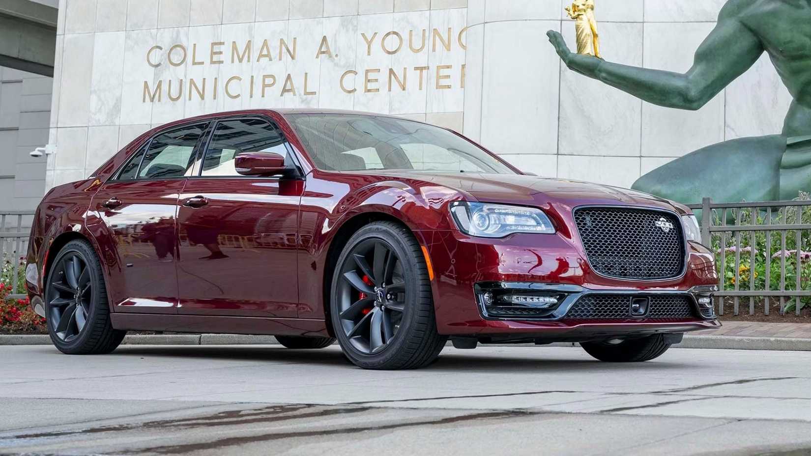Red 2022 Chrysler 300 front 3/4 shot parked