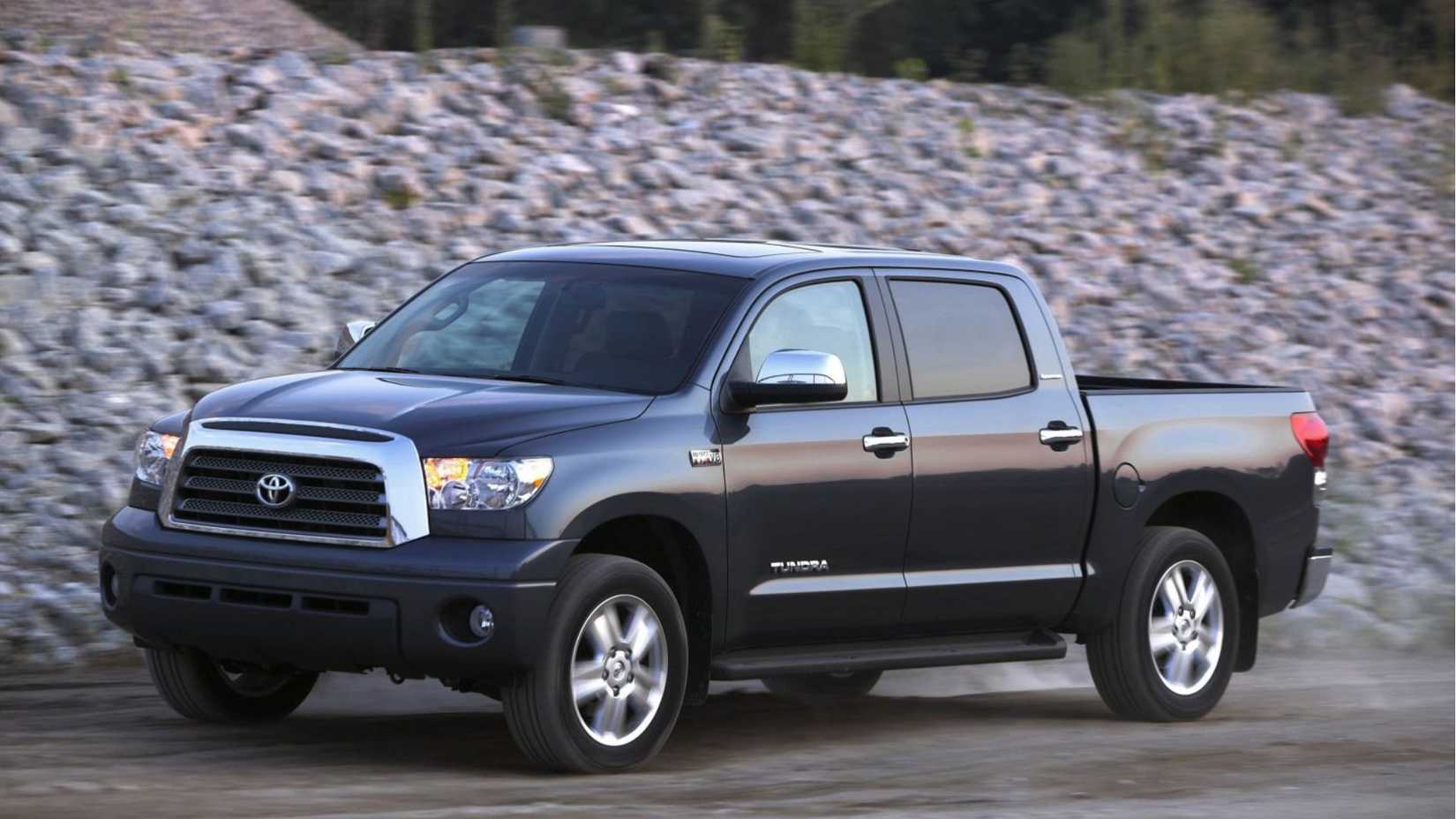 2008 Toyota Tundra CrewMax front 3/4 shot driving on dirt road