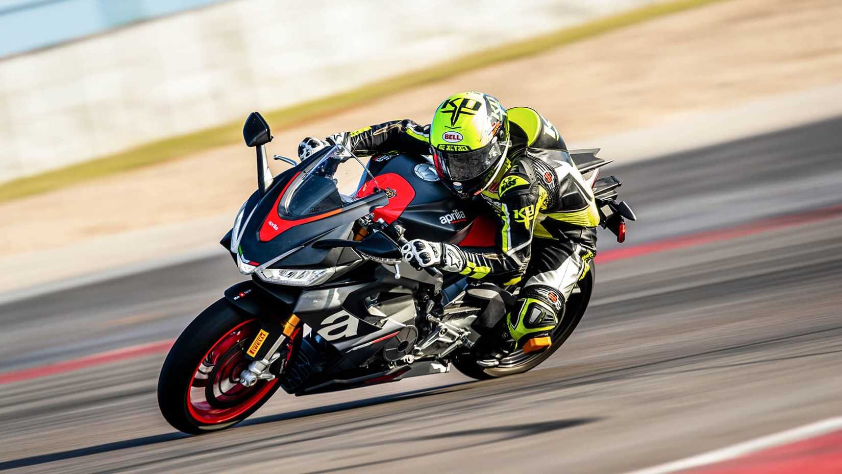 Action shot of the Aprilia RS 660 on a race track