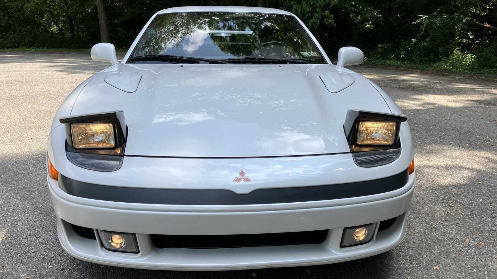 1992 Mitsubishi 3000GT VR-4 5-Speed In white Posing outside under trees
