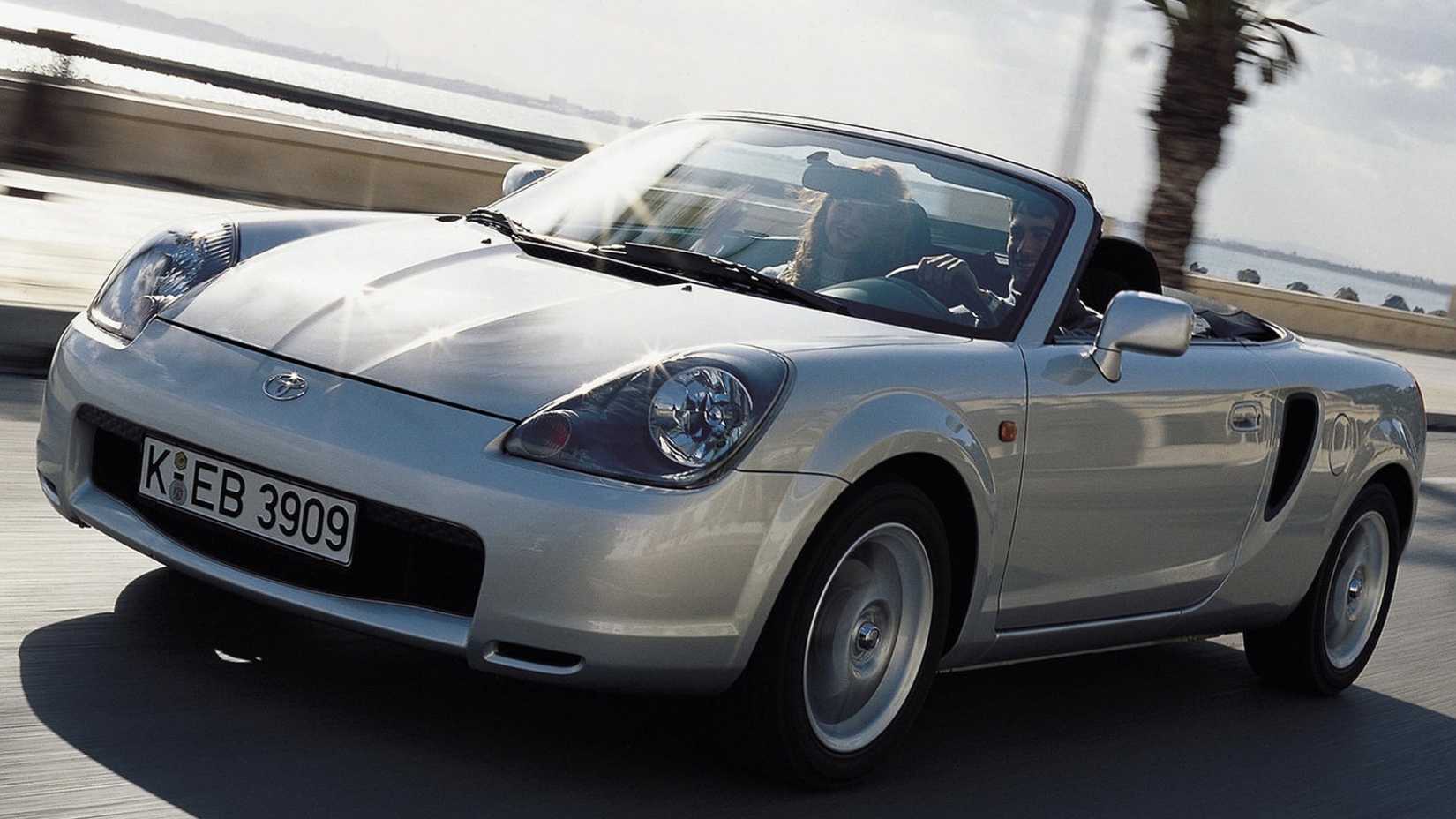 2000 Toyota MR2 in silver driving on coastal road
