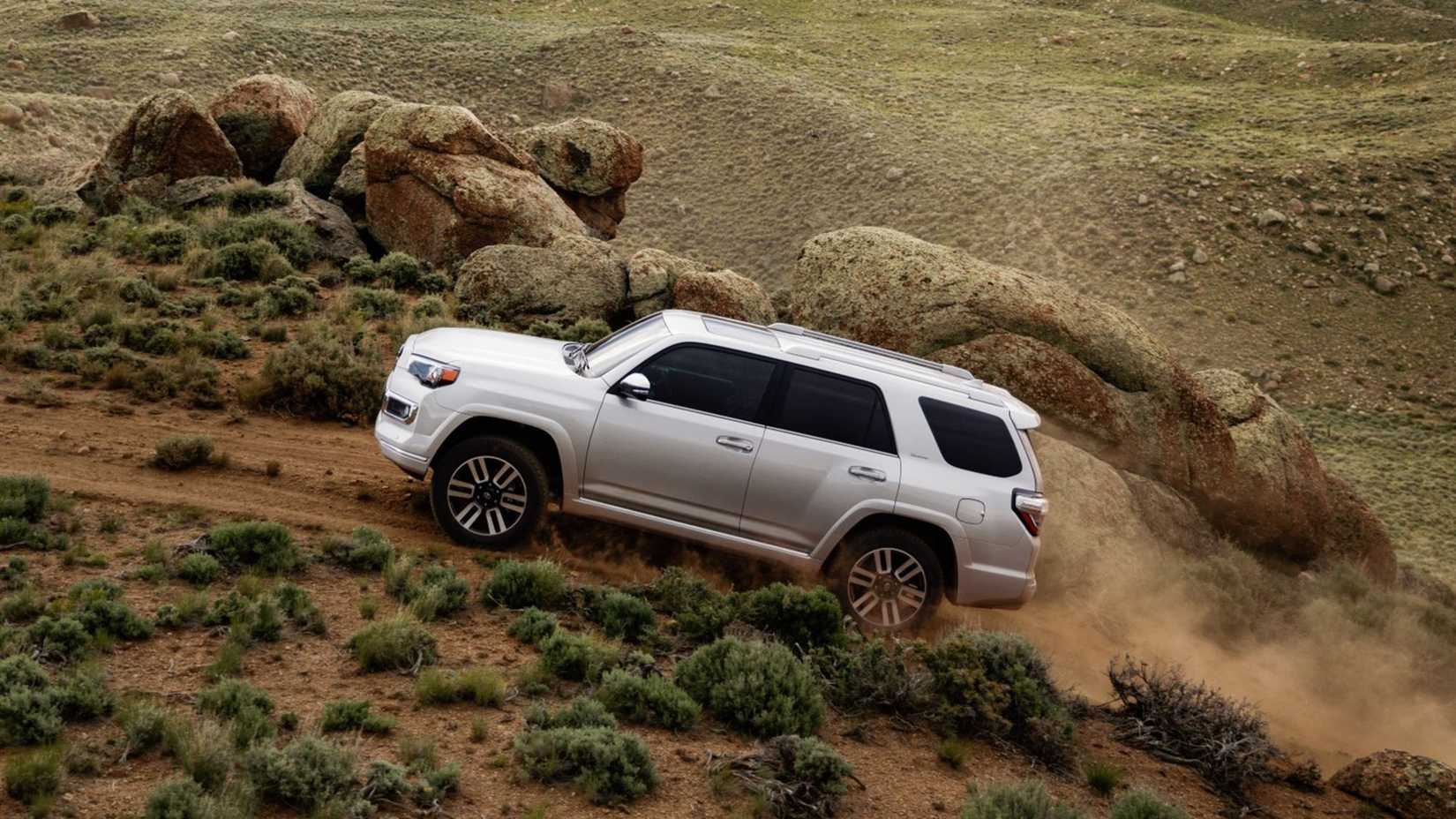 Side shot of a white 2024 Toyota 4Runner off-roading