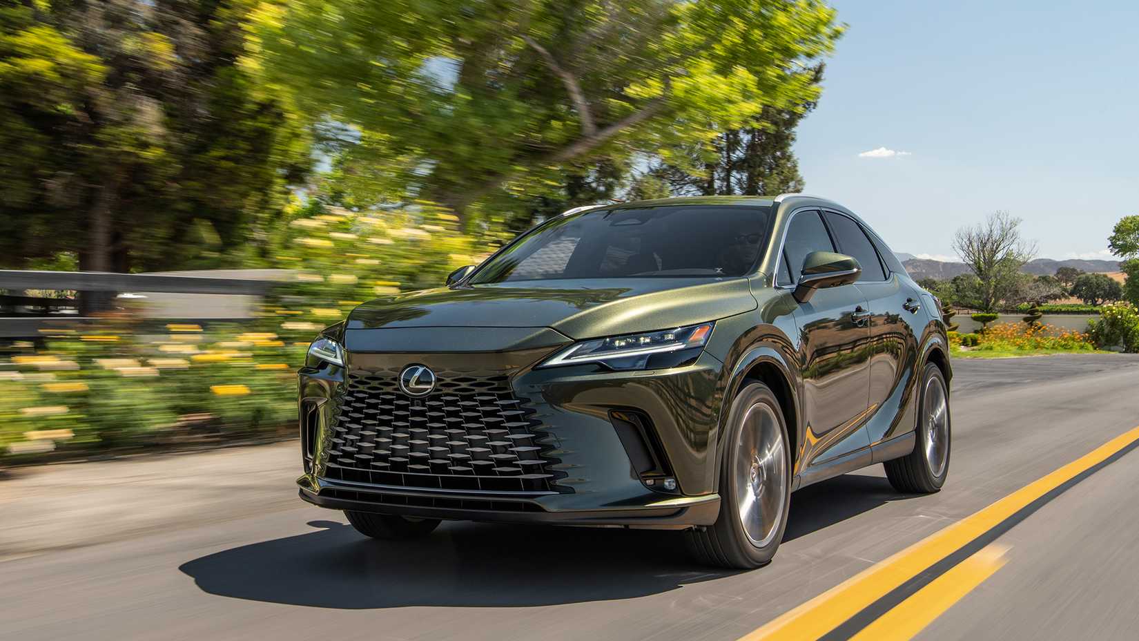 2023 Lexus RX 450 Hybrid Plug-In front 3/4 action shot