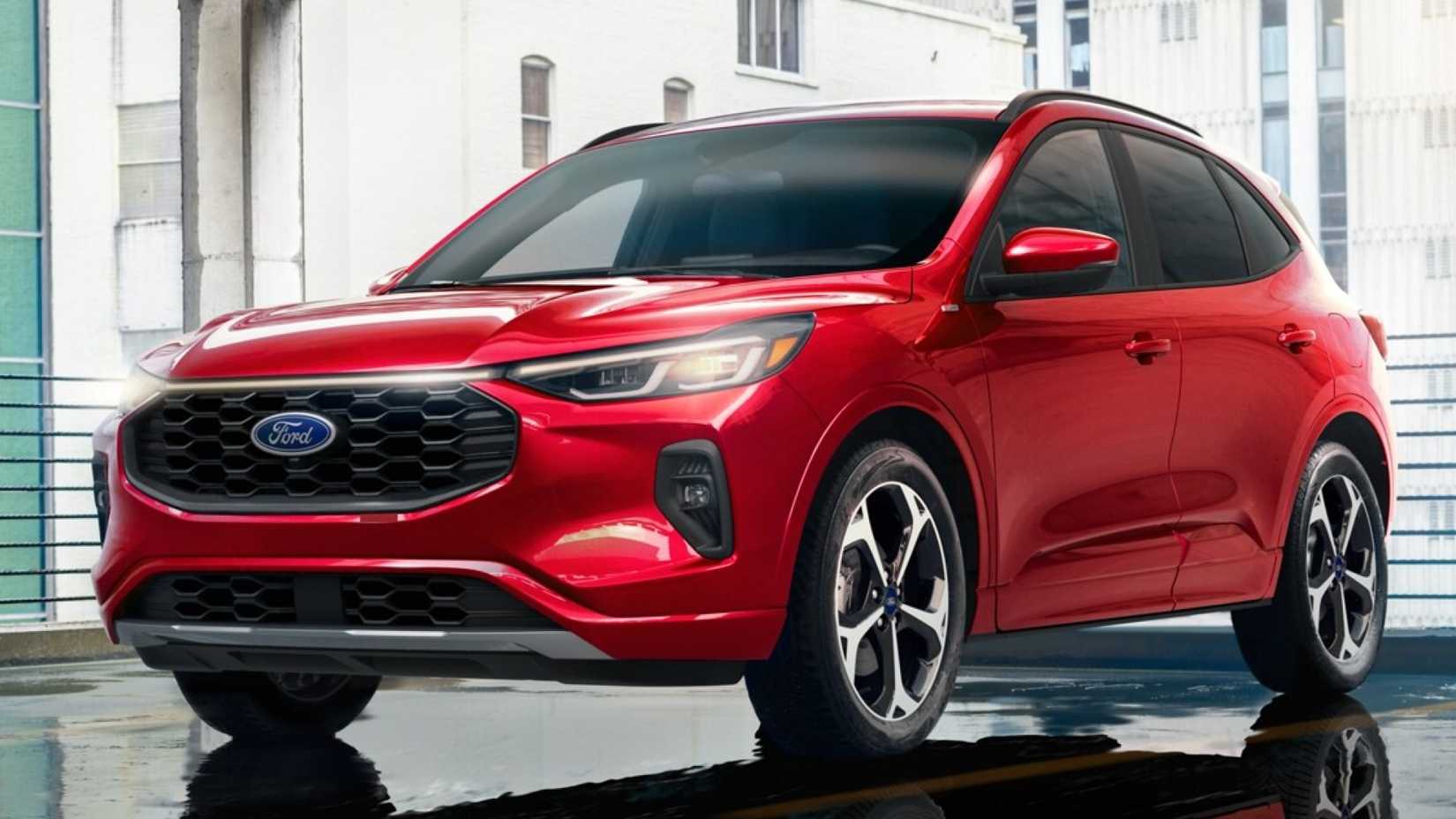 2024 Ford Escape Hybrid front 3/4 shot parked in front of buildings