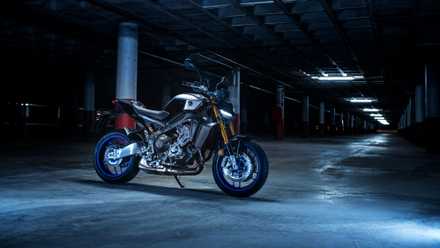 A dramatic shot of the 2024 Yamaha MT-09 SP parked in a garage