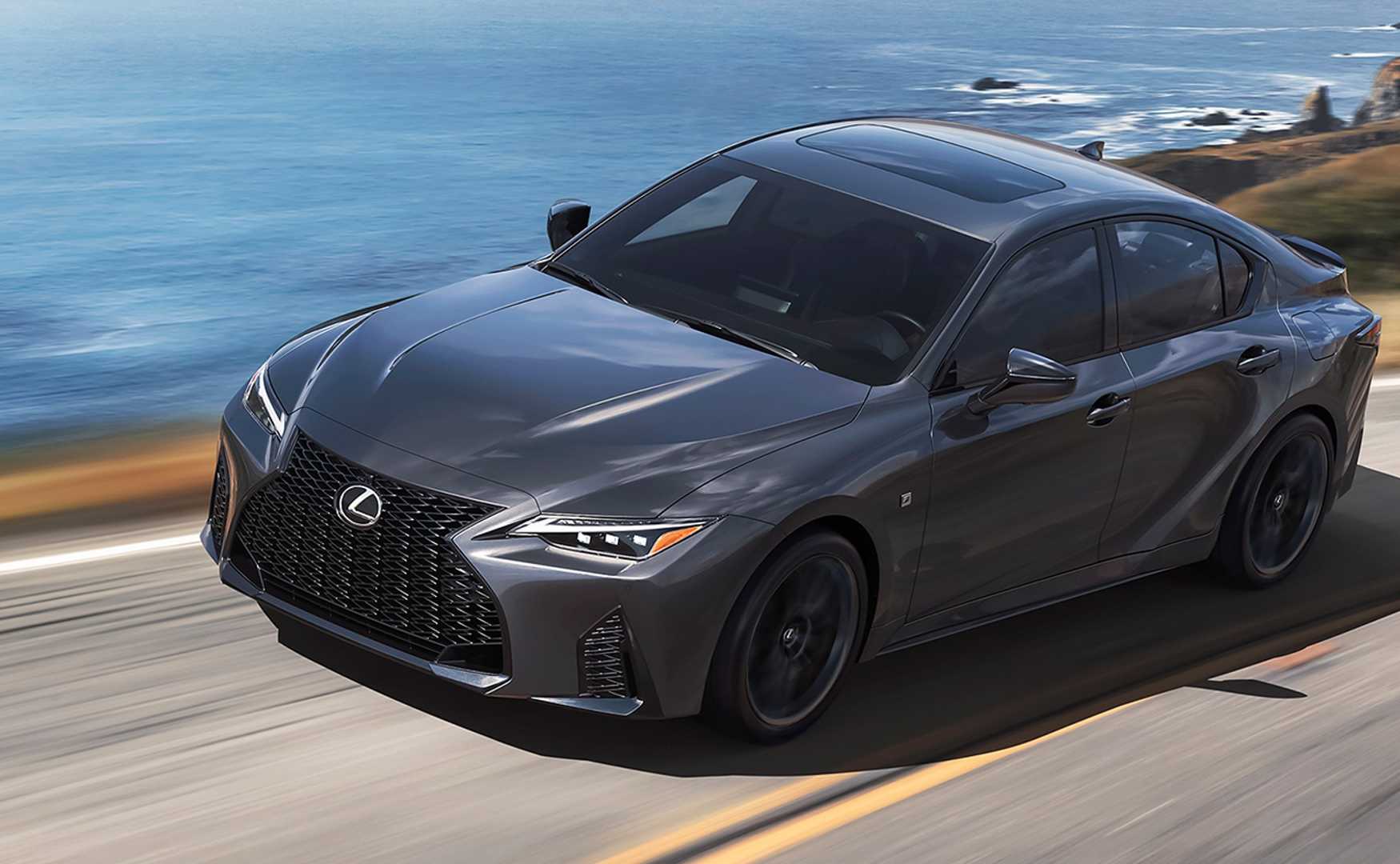 Gray 2024 Lexus IS500 F Sport Front 3/4 shot driving on the road
