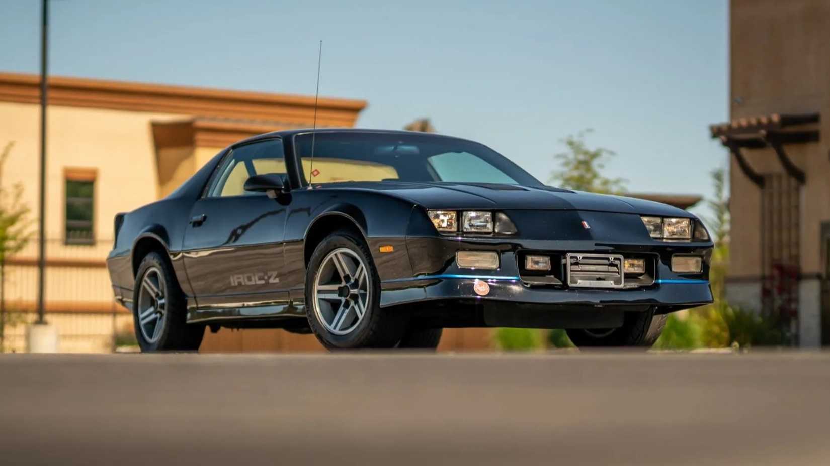A gloss-black 1988 Chevrolet Camaro IROC-Z Coupe 