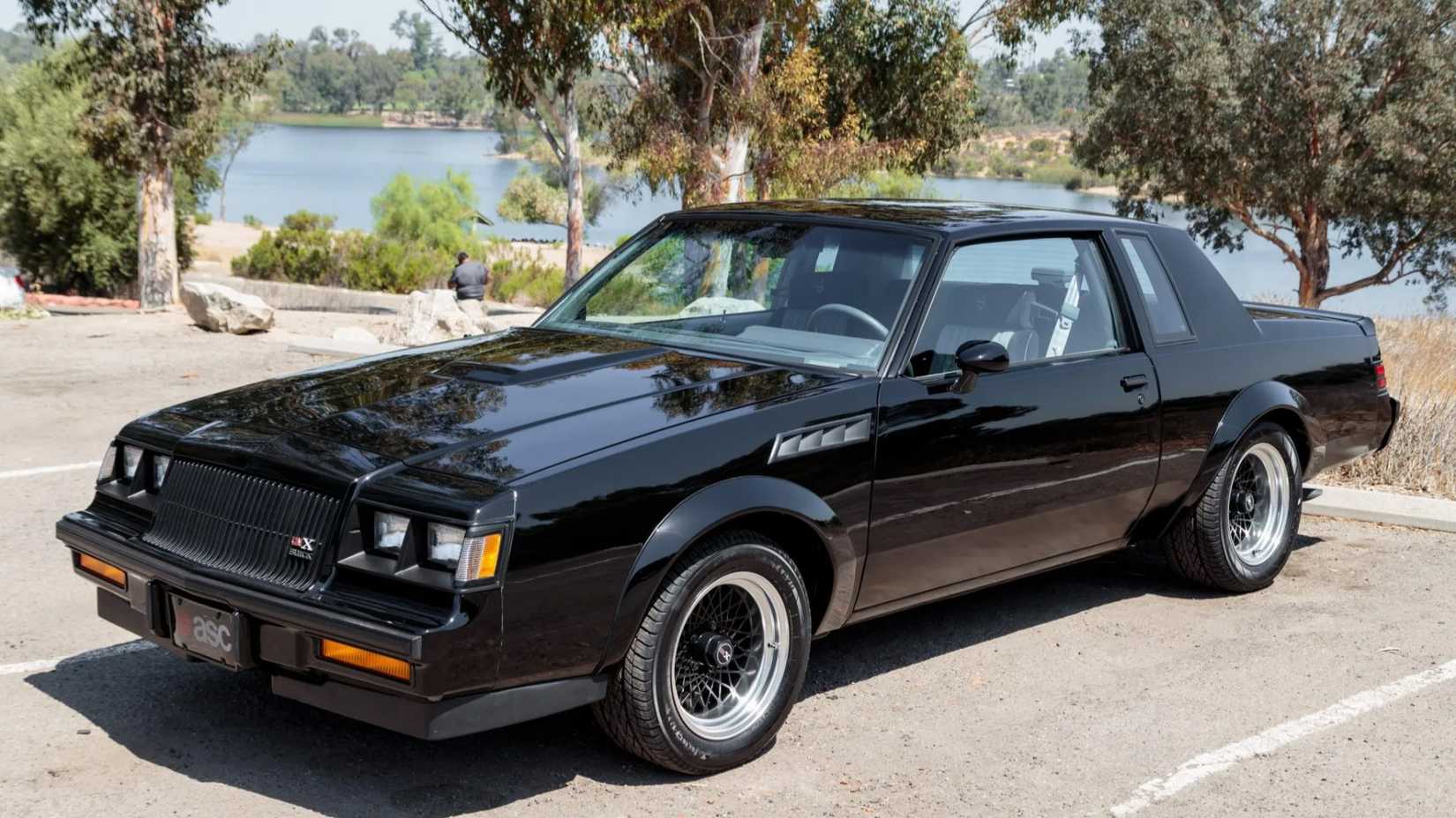 1987 Buick GNX in black parked in parking lot
