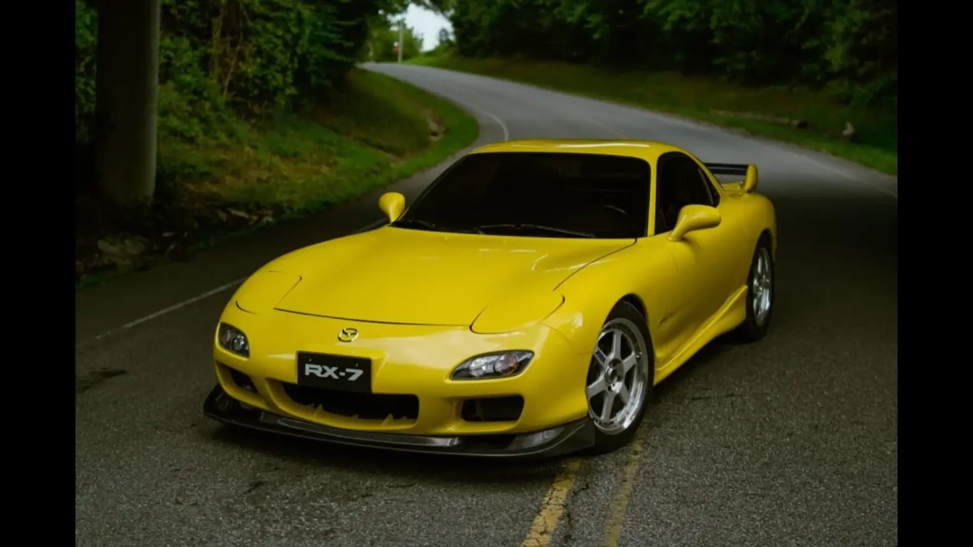 Sun-yellow Mazda RX-7 FD
